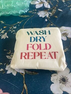 Cream Laundry Pouch with Colorful Typography - "Wash Dry Fold Repeat"